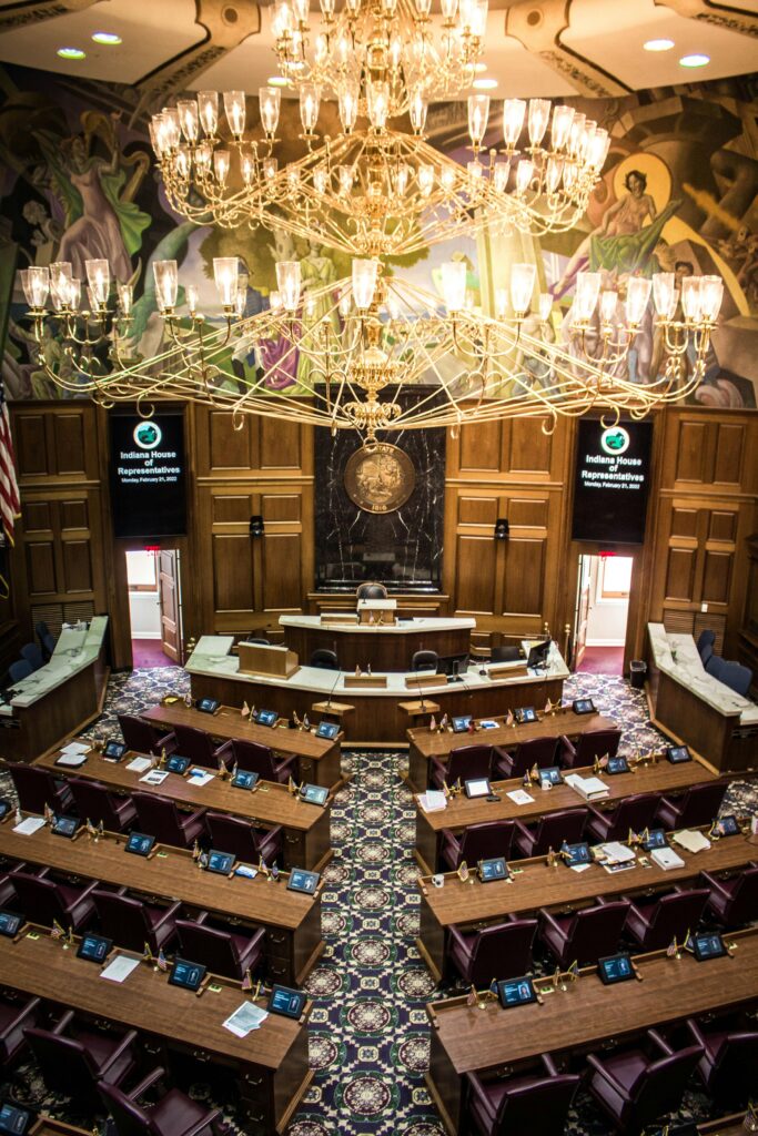 Elegant view of legislative chamber with grand chandelier in Indianapolis, IN.